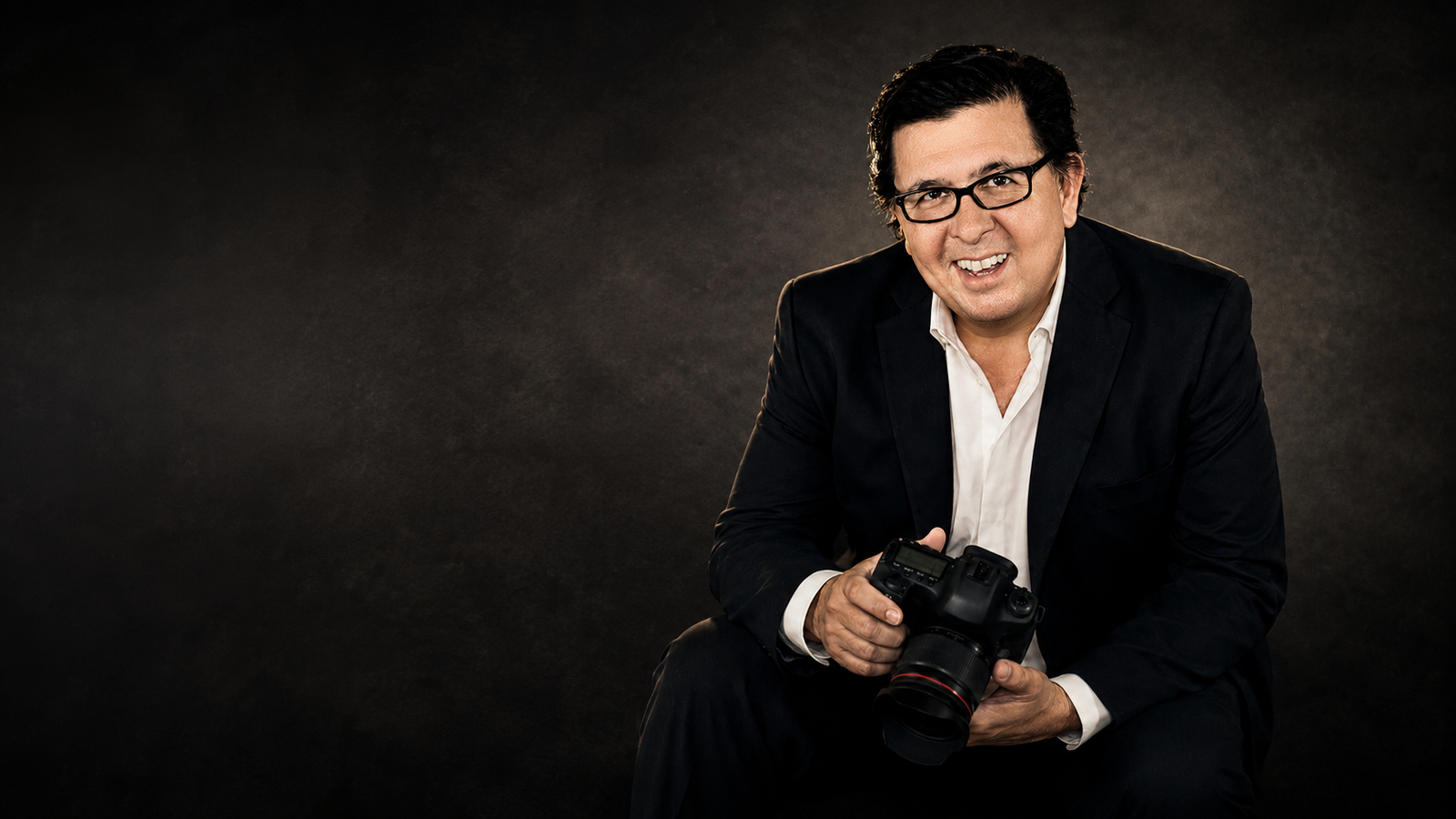 C. Scott Stephens holding his camera
